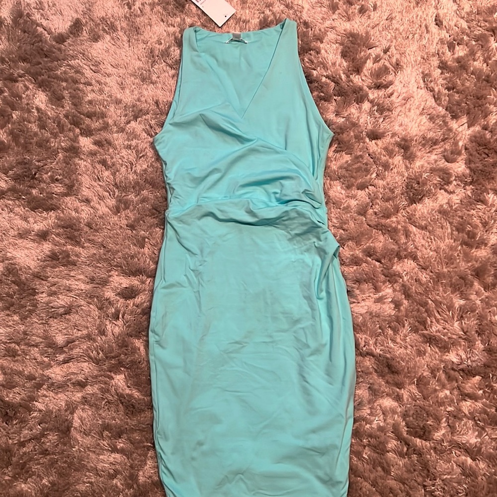 Never worn Turquoise v- neck midi dress.cotton super comfy, great for vacation.